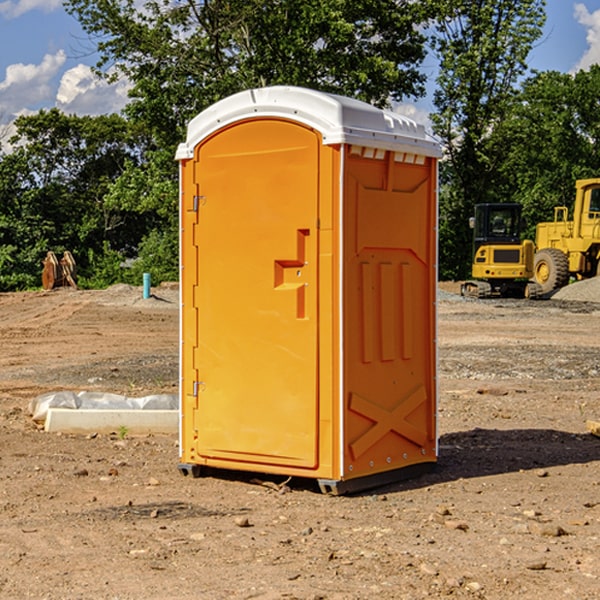 how often are the portable restrooms cleaned and serviced during a rental period in Pine Lake WI